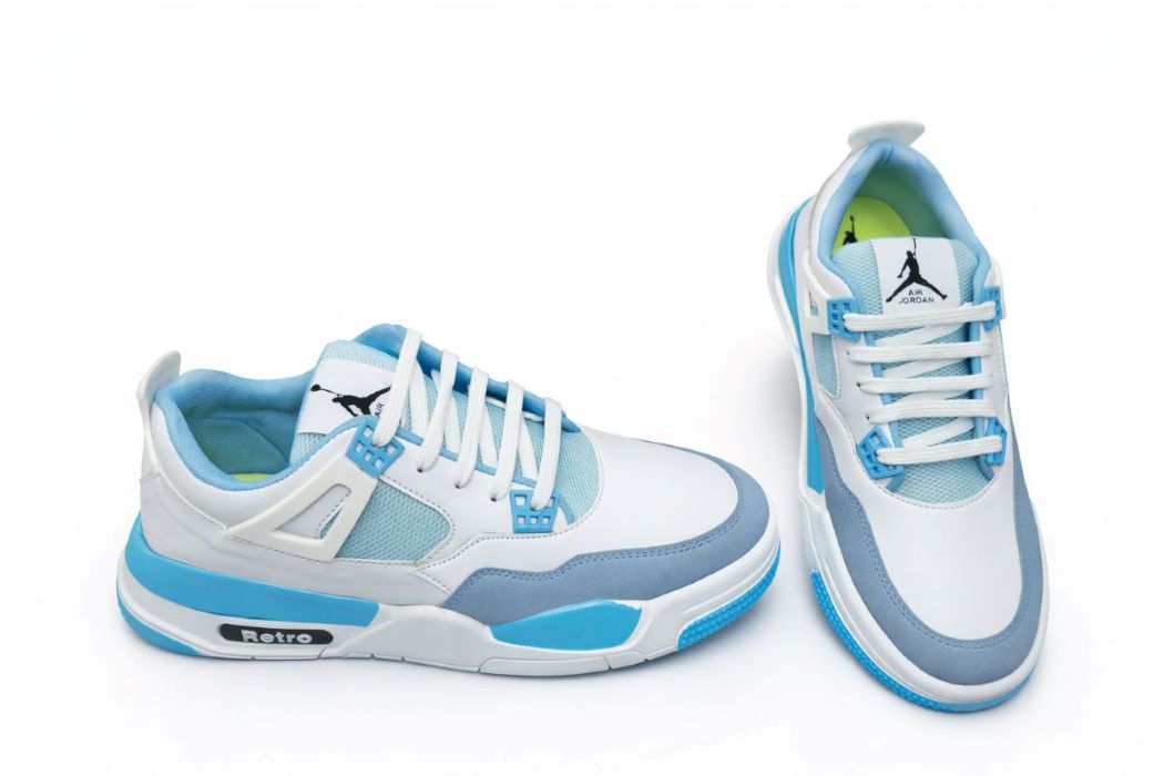 Blue Retro Sneakers Blue and white retro style sneakers with modern design and soft cushioning.